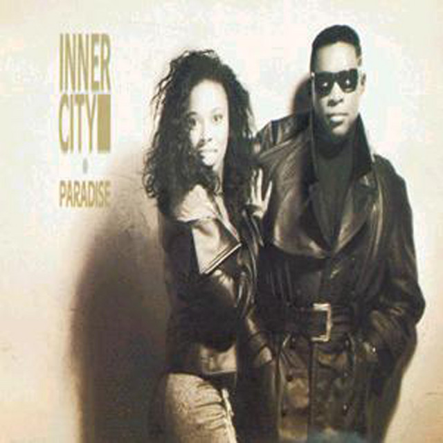 Paradise — Inner City (1988). Kevin Saunderson's most commercially successful project, with vocalist Paris Grey. 'Good Life' and 'Big Fun' reached the UK charts and introduced the Detroit machine-music aesthetic to mainstream pop audiences — the bridge between the Detroit underground and the broader electronic music market that Berlin would later occupy.