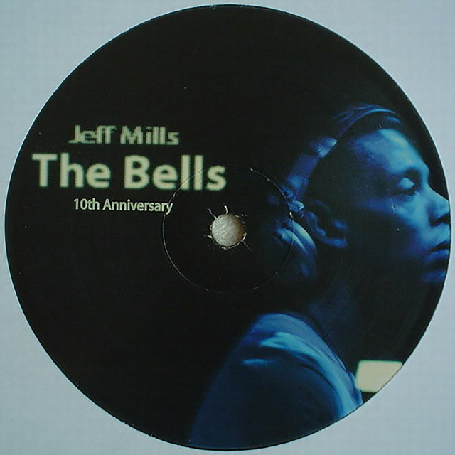 The Bells — Jeff Mills (1996). Released on Tresor Records, Berlin. This is the record that defines the Mills aesthetic: a single cycling motif, a drum pattern engineered to produce focused dissociation, and a total refusal of conventional song-form. It was a Tresor release — a Detroit producer on a Berlin label.