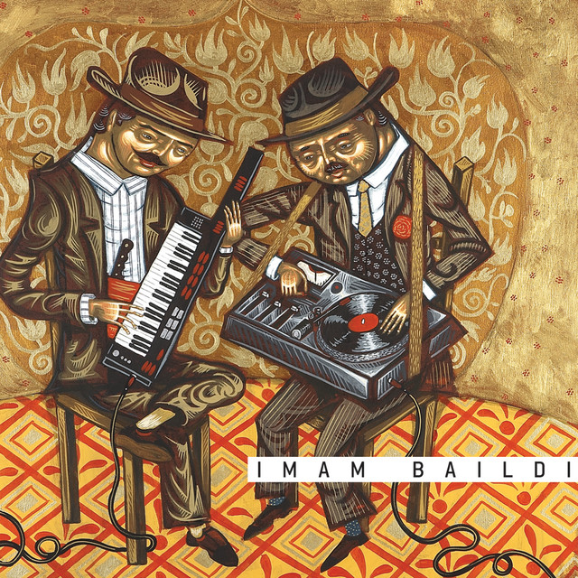 Imam Baildi — the self-titled debut. The Greek electro-rebetiko collective takes 1930s-1950s shellac originals and rebuilds them in contemporary pop production: the original vocal preserved, the arrangement entirely remade. Their O Pasatebos Remix (featuring the original Manolis Hiotis vocal) became a modern rebetiko anthem.