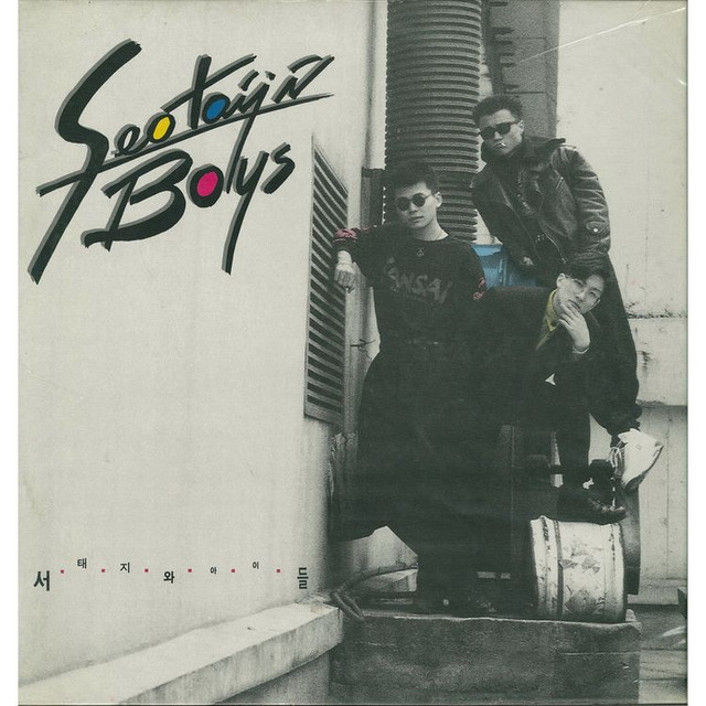 Seo Taiji and Boys (1992). The sleeve is modest enough — three young men in casual clothes — but the record it contains is the pivot point of modern Korean pop. Seo Taiji was 20 when this was released. The idol system he accidentally invented would become a multi-billion-dollar industry within a decade.