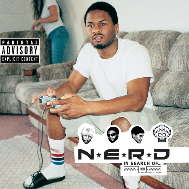 In Search Of... β the debut album by N.E.R.D., 2001/2002. The full band project (Pharrell, Chad Hugo, Shay Haley) released in two separate versions: a synth-heavy 2001 European mix, then a band-rerecorded 2002 US version with the Minneapolis funk-rock group Spymob. The album is the keystone β the un-hidden Pharrell, three years into an era when he was simultaneously producing half the Hot 100.