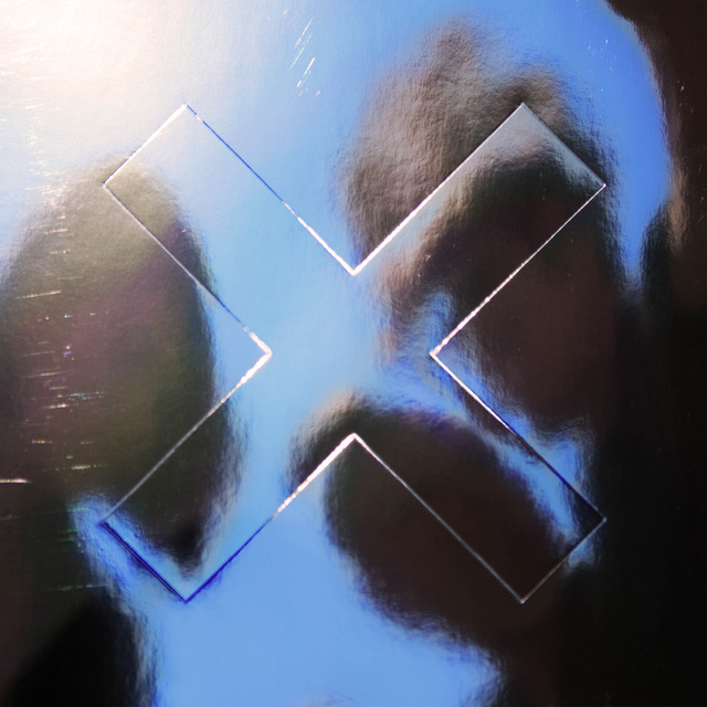 The xx — I See You, 2017. Their third album; the record that shifted the duo's palette toward daylight. In 2026 they are Saturday's headliner — their first full tour in nearly a decade. The I See You live show is one of the most visually precise productions in contemporary indie music.