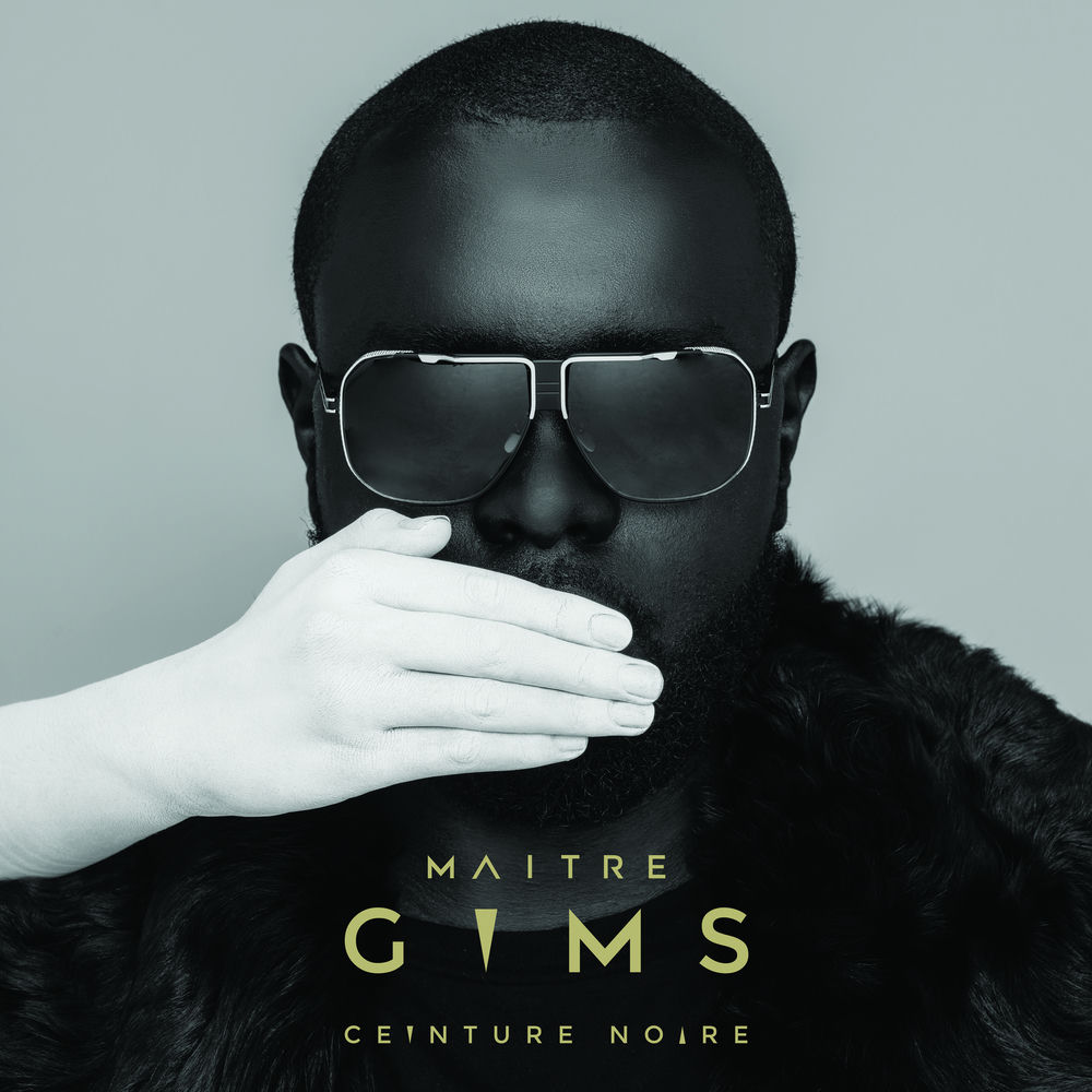 GIMS — Ceinture Noire (2018). Gims is the solo project of Maître Gims (Gandhi Djuna), who left Sexion d'Assaut with one of the clearest creative trajectories in French-language pop. 'Ceinture Noire' is the pivot record — away from the street-rap of the Sexion years, toward global R&B production and a larger melodic ambition.